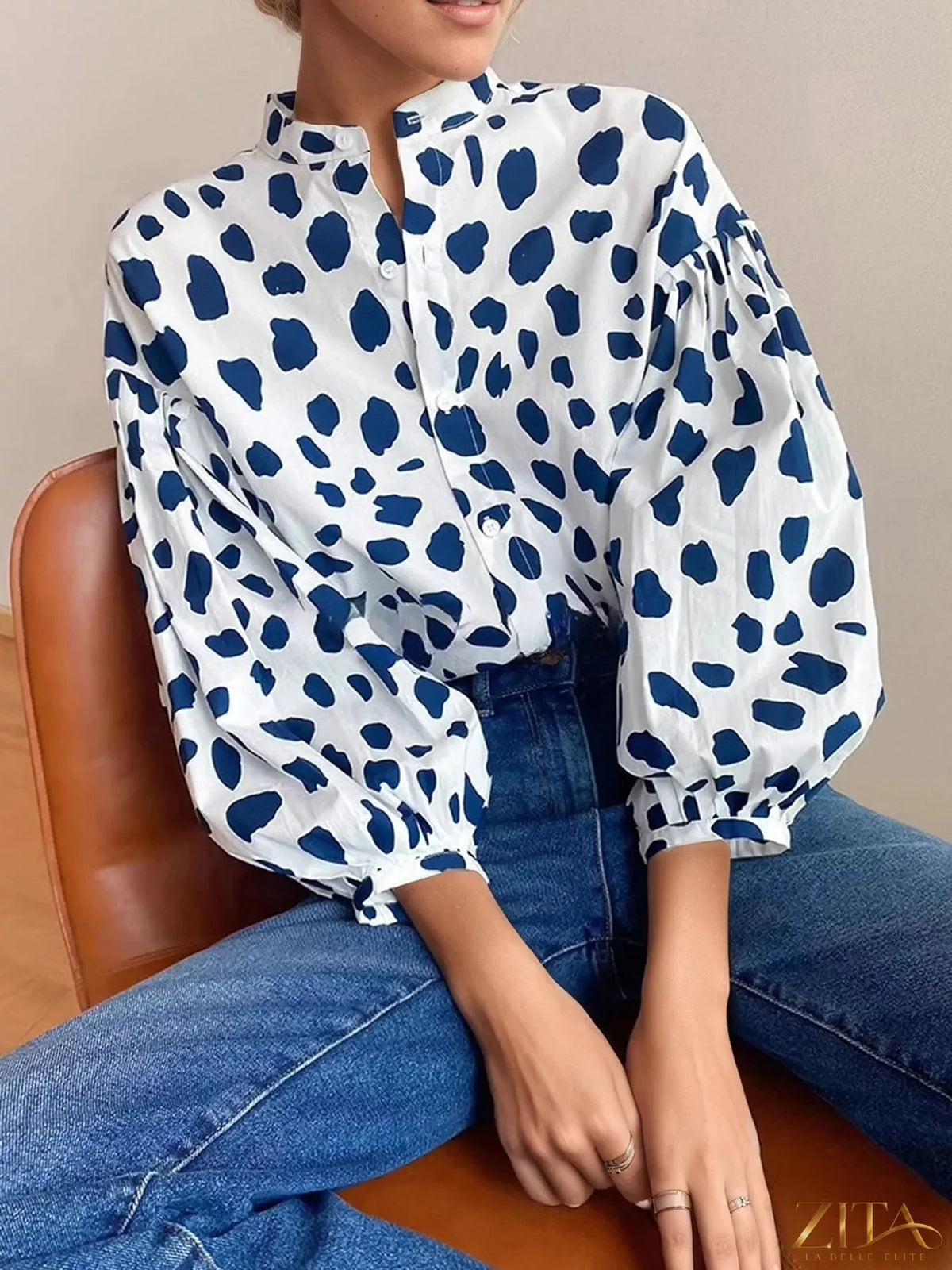 Printed puff sleeve button-down shirt by Zita La Belle Elite, featuring a stylish pattern and feminine puff sleeves.