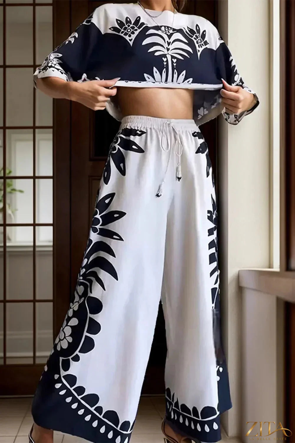 Printed half sleeve top and wide-leg pants set by Zita La Belle Elite, showing the stylish matching outfit and fabric details.