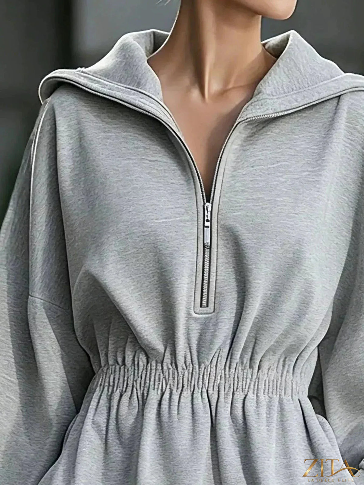 Casual Zita La Belle Elite hooded quarter-zip sweatshirt dress in soft fabric, featuring a relaxed fit and front zipper detail.