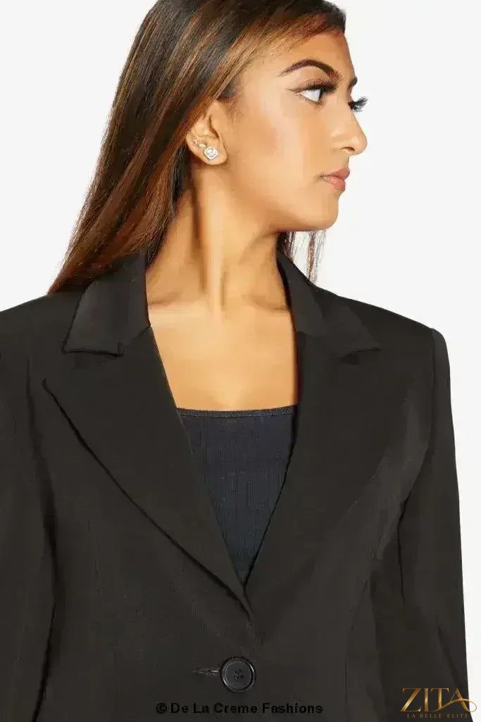 Zita La Belle Elite women's formal longline blazer with a collared design and tailored fit, shown in a stylish professional setting.