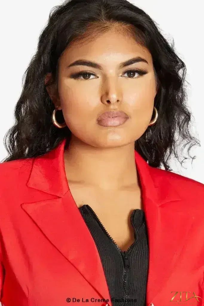 Zita La Belle Elite De La Creme women's longline formal blazer with a collared design and tailored fit, shown in a professional setting.