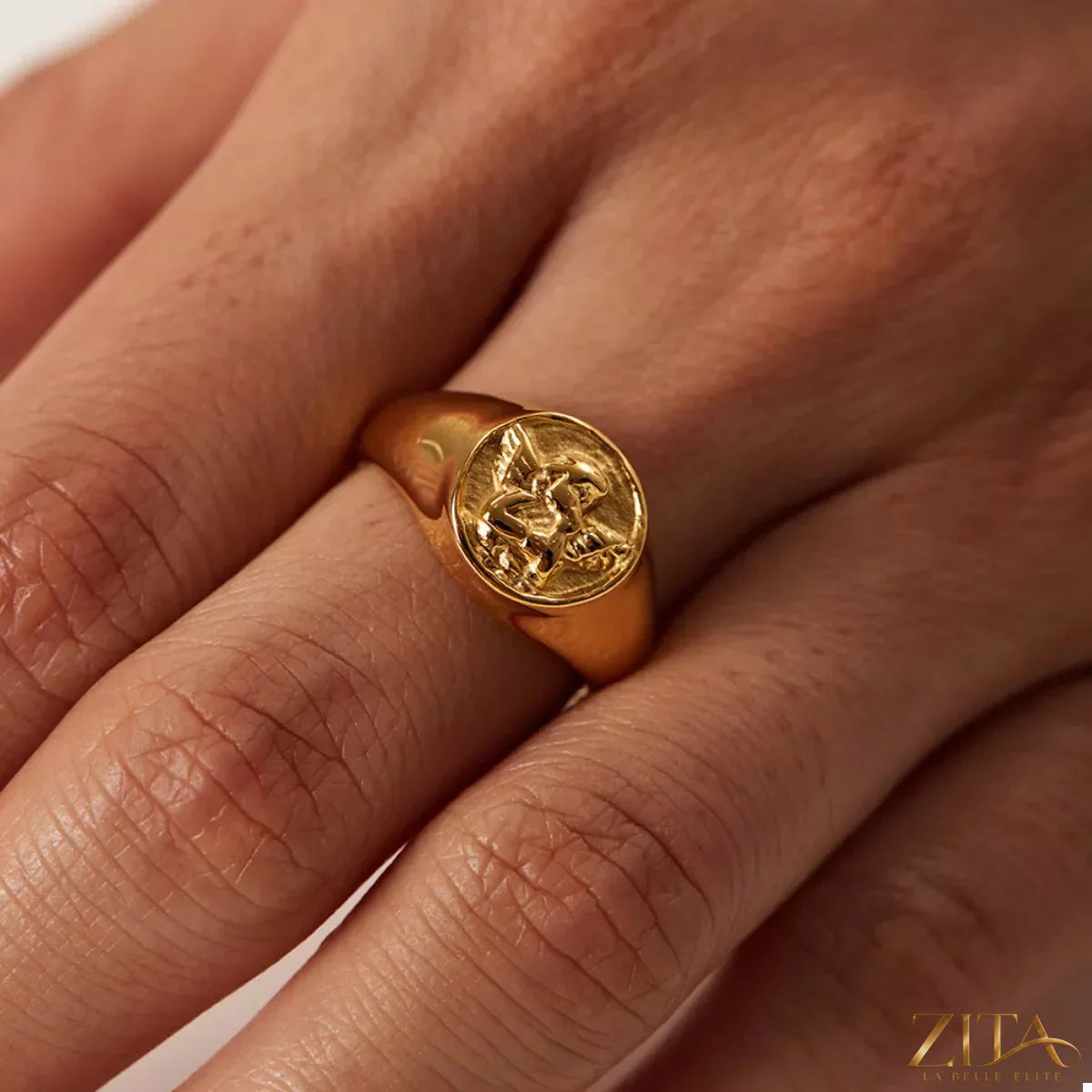 18K gold-plated Cupid ring by Zita La Belle Elite featuring a detailed cupid design and elegant band.