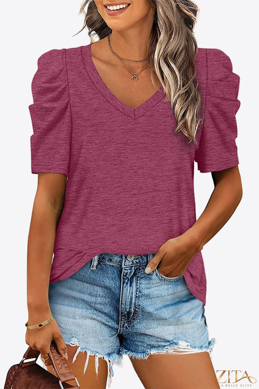 V-Neck Puff Sleeve Tee from Trendsi with soft fabric and stylish puff sleeves, displayed on a neutral background.