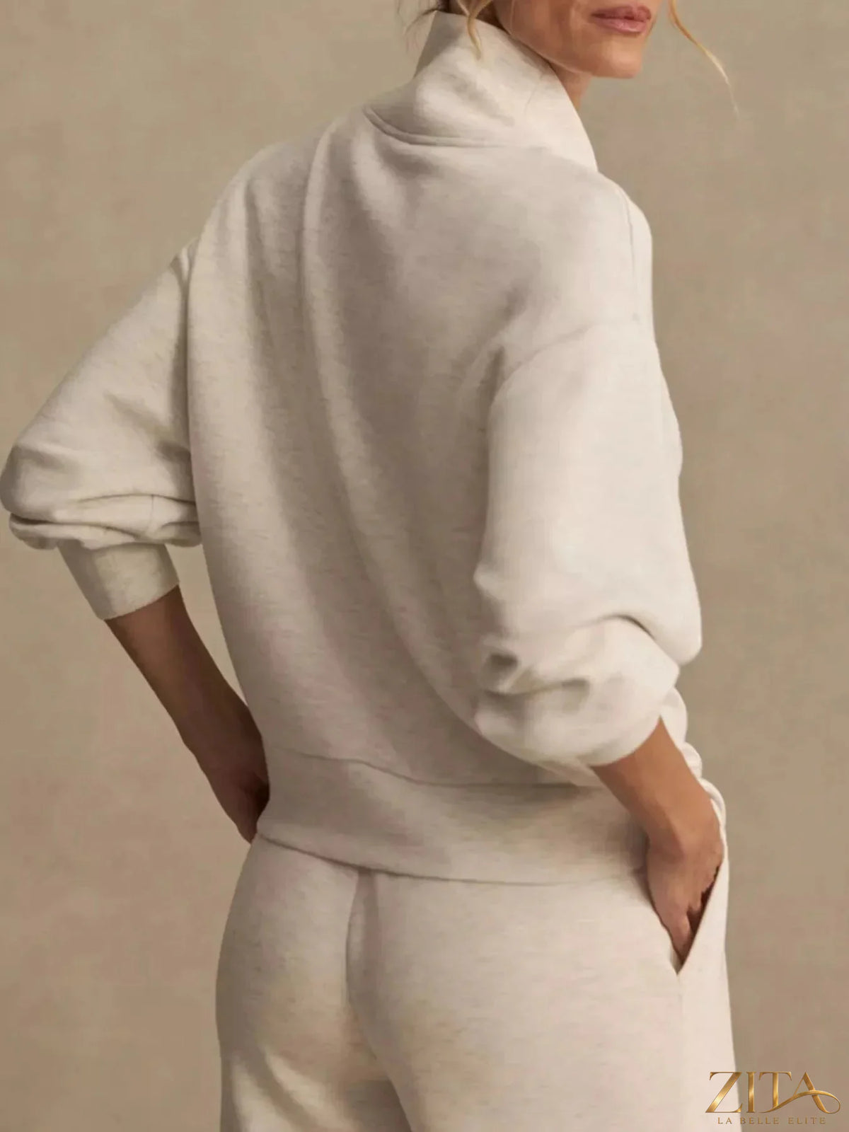 Zita La Belle Elite quarter-zip sweatshirt and wide-leg pants set, soft fabric, neutral tones, casual loungewear style.