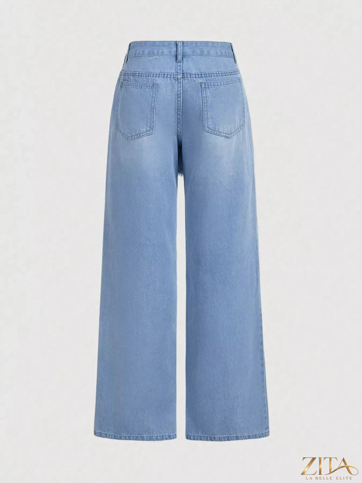 Zita La Belle Elite asymmetric raw hem wide-leg jeans displayed on a model, showcasing their relaxed fit and stylish design.