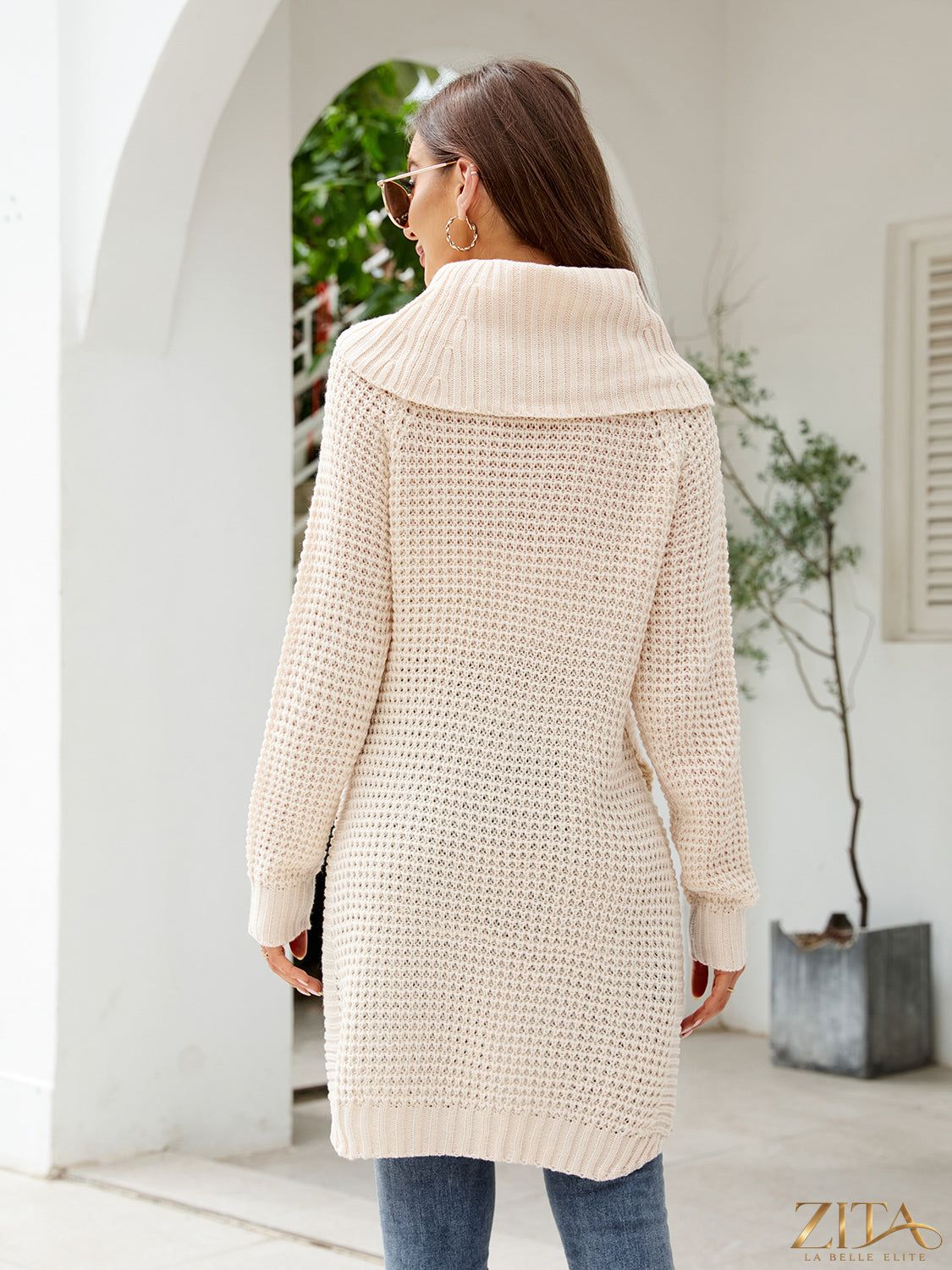 Waffle-knit turtleneck sweater dress with slit detail, stylish and cozy Trendsi women's knit dress worn on a model.
