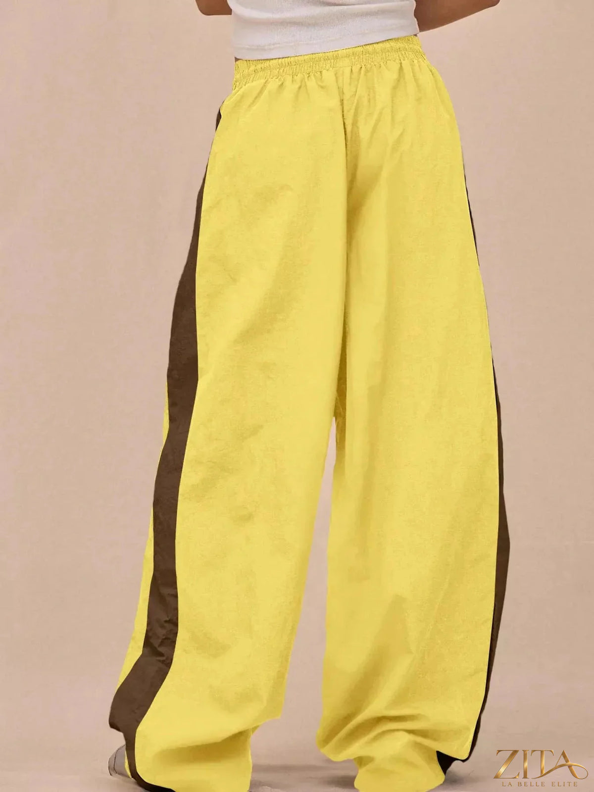 Color-block Zita La Belle Elite tracksuit and wide-leg pants set featuring vibrant color panels and a comfortable fit.