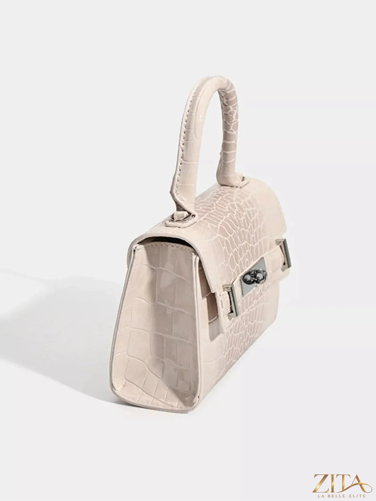 Zita La Belle Elite croc-embossed top handle handbag with structured design and gold-tone hardware, shown from front angle.