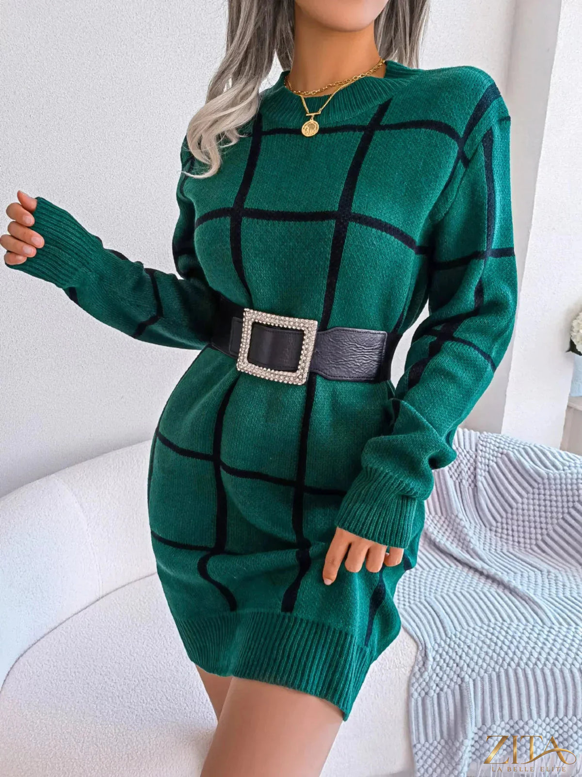 Zita La Belle Elite plaid pattern long sleeve sweater dress displayed on a mannequin in a cozy indoor setting