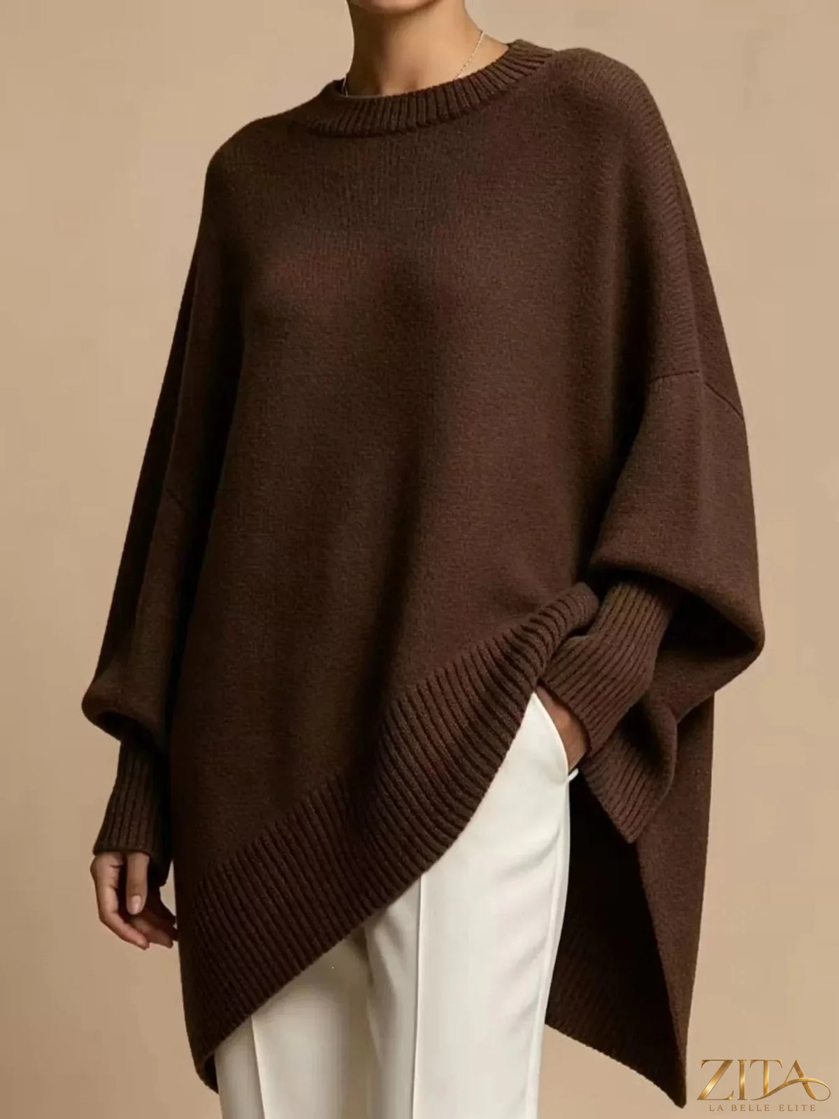 Oversized dropped shoulder sweater in soft fabric, featuring a relaxed fit and trendy style, by Trendsi.