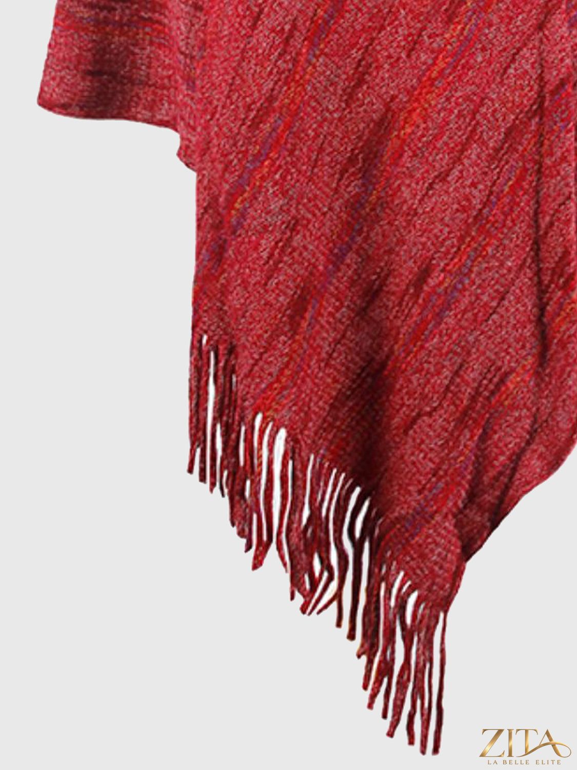 Zita La Belle Elite fringe hem hooded poncho in soft fabric with a relaxed fit and tassel details.
