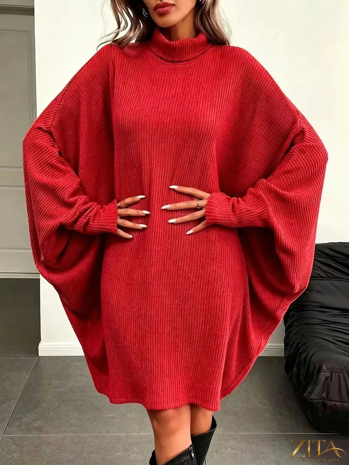 Zita La Belle Elite oversized batwing sleeve ribbed knit turtleneck dress on a model, showcasing its relaxed fit and cozy fabric.