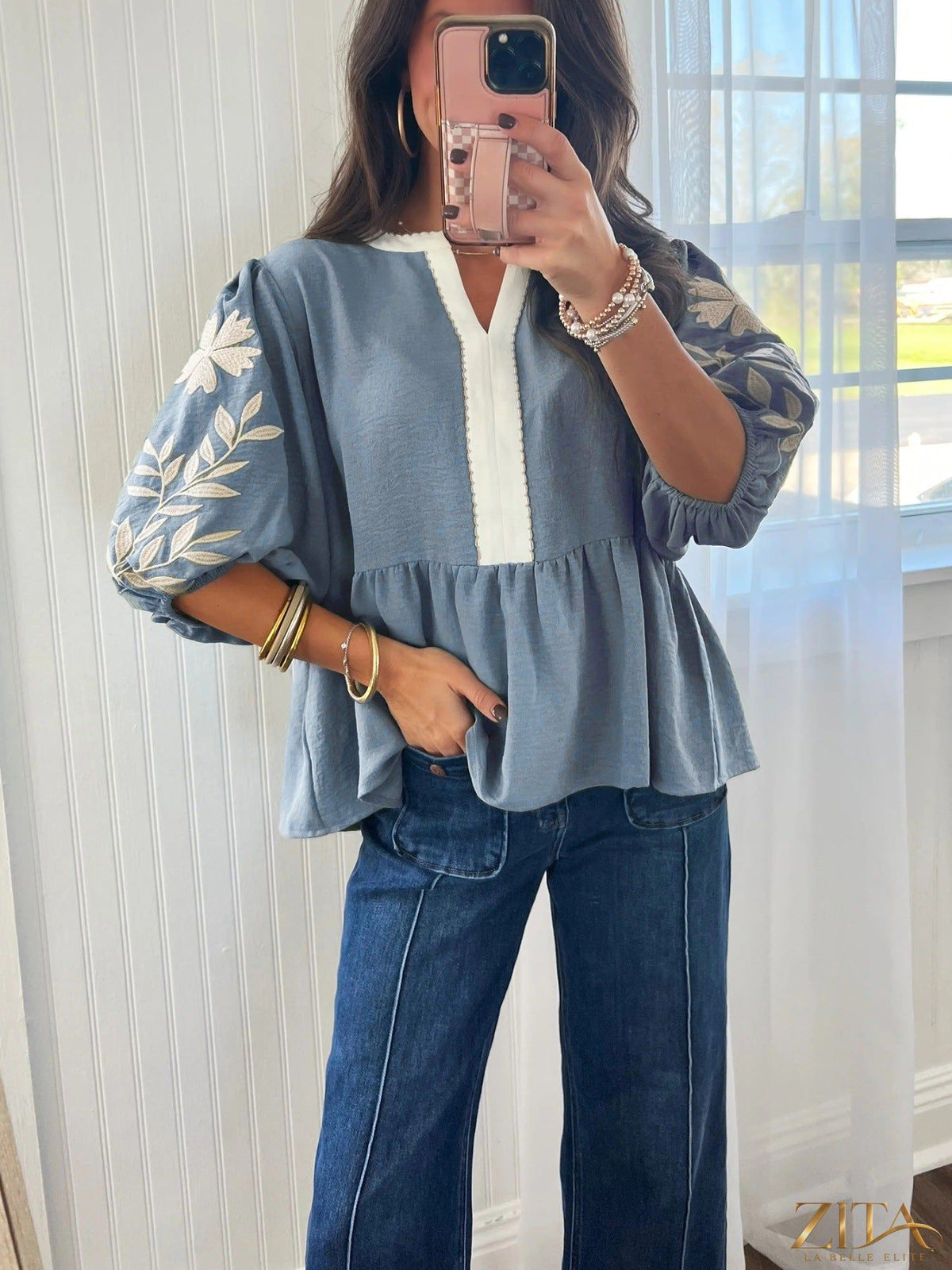 Zita La Belle Elite embroidered sleeve peplum blouse featuring intricate floral embroidery and a fitted waist, stylish and feminine.