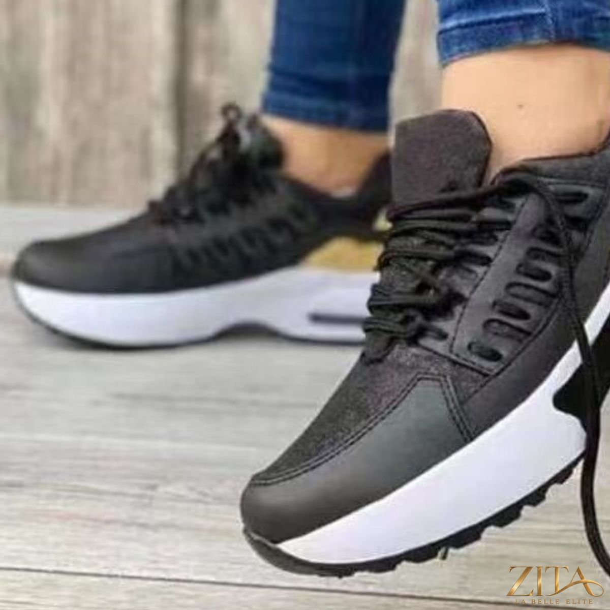 Zita La Belle Elite lace-up round toe sneakers with white and black design, featuring classic style and comfortable fit.
