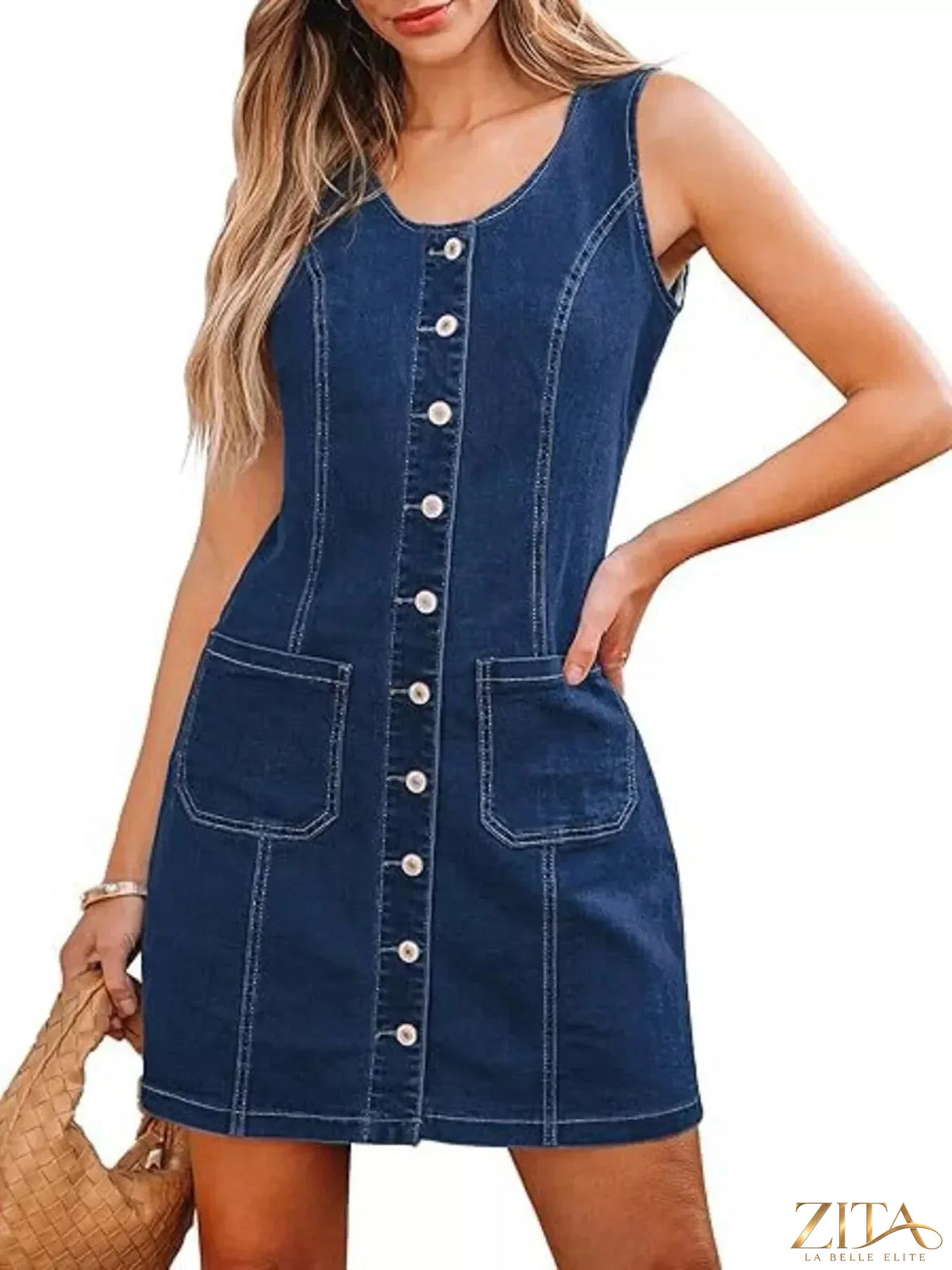 Sleeveless denim dress with button-front closure, casual style from Trendsi, shown hanging on a plain background.