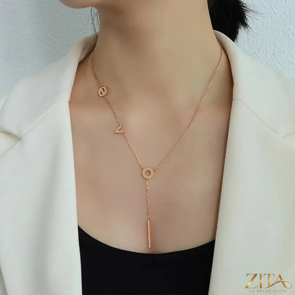 Titanium steel letter necklace with a sleek pendant, featuring a modern design from Zita La Belle Elite.