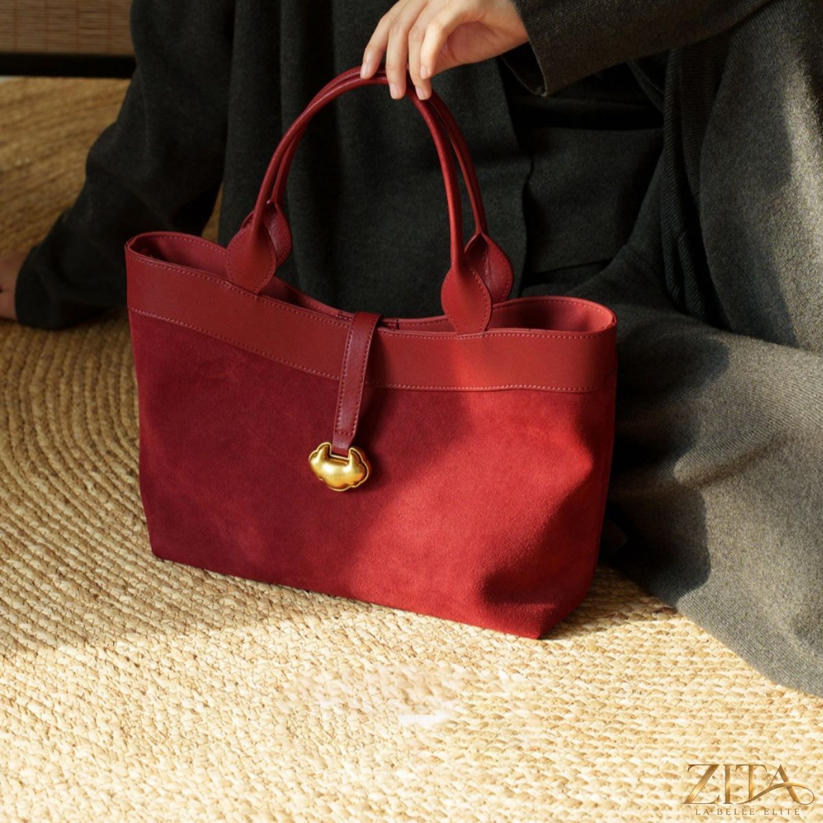 Zita La Belle Elite top handle tote bag in sleek leather with dual top handles and spacious interior for everyday use.