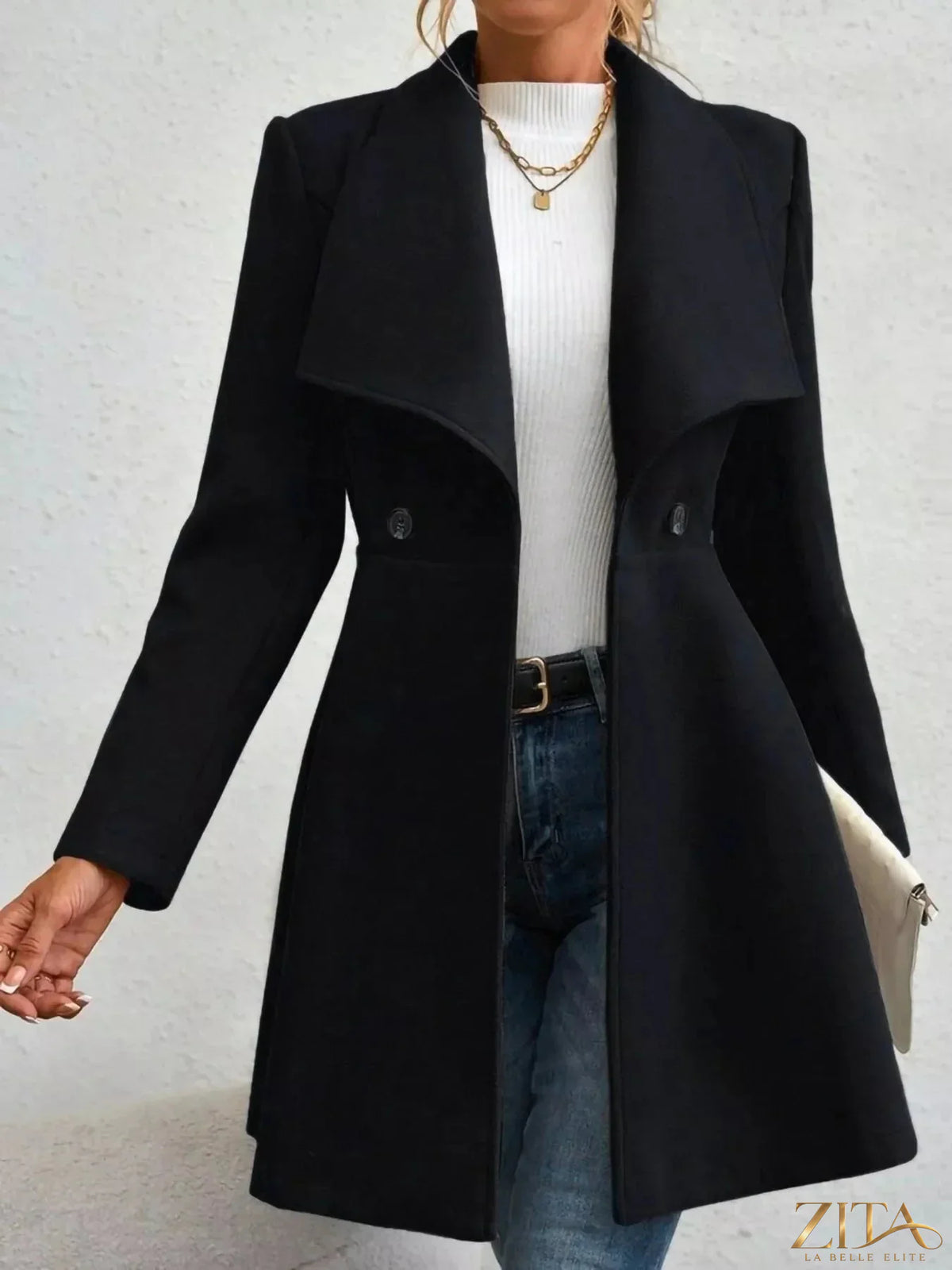 Zita La Belle Elite collared neck double-breasted coat displayed on a hanger, showcasing its classic style and tailored fit.