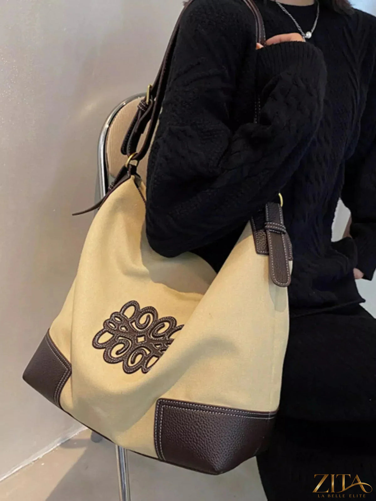Embroidered canvas tote bag by Zita La Belle Elite with colorful floral embroidery and sturdy handles, perfect for daily use.