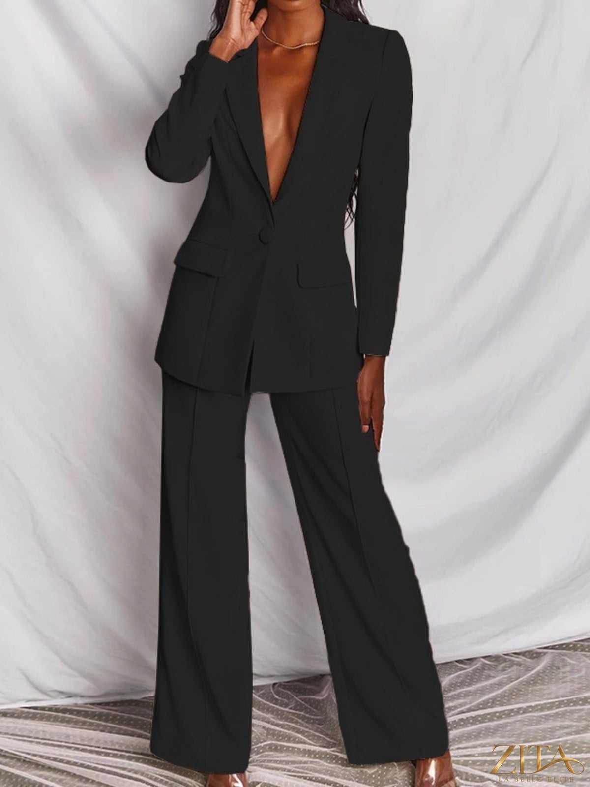 Plus size Zita La Belle Elite blazer and wide-leg pants set, featuring a one-button blazer and flowing wide-leg trousers.