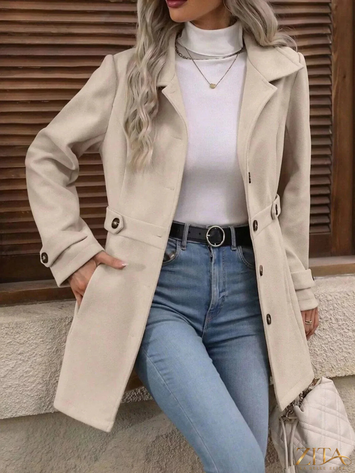 Zita La Belle Elite button-up long sleeve coat in a stylish design, shown on a model with the coat fully buttoned and collar visible.