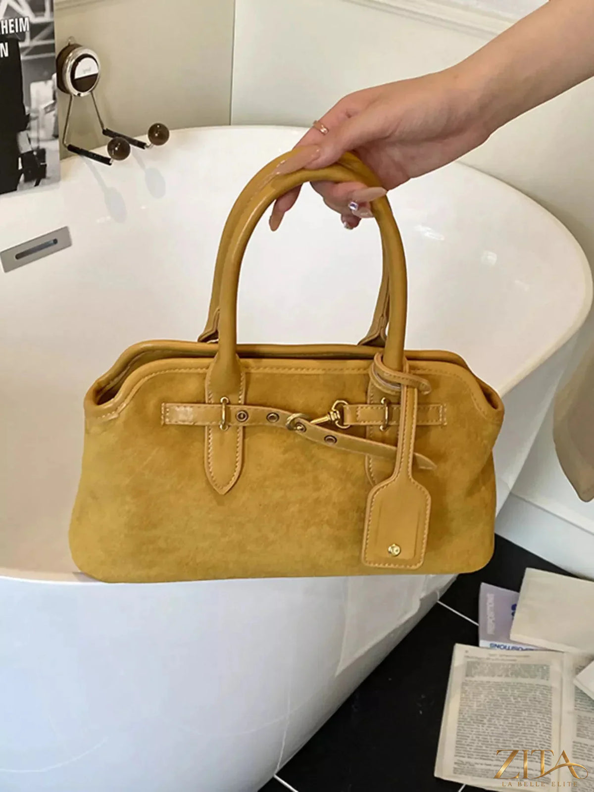 Vintage buckle detail handbag by Zita La Belle Elite, featuring a stylish design with a prominent buckle accent and classic leather finish.