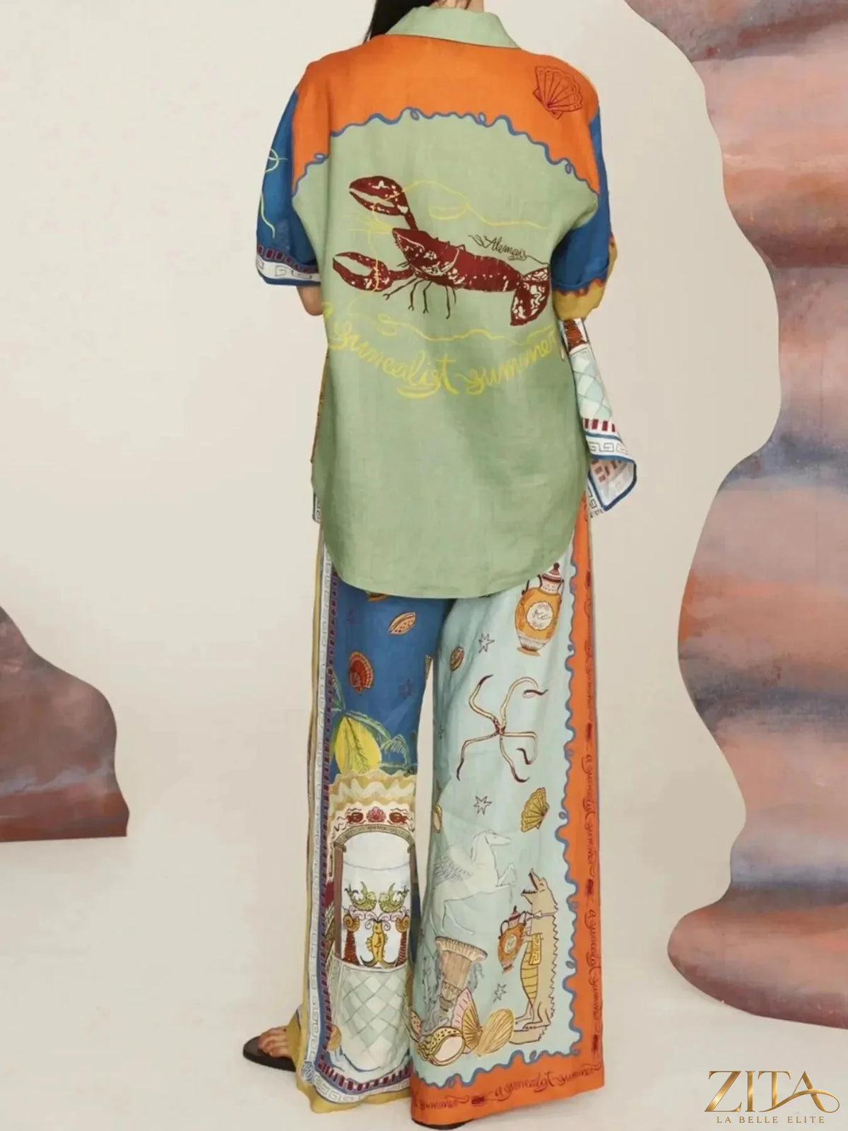Zita La Belle Elite printed button-up shirt and pants set, featuring a stylish, coordinated design in a modern fashion style.
