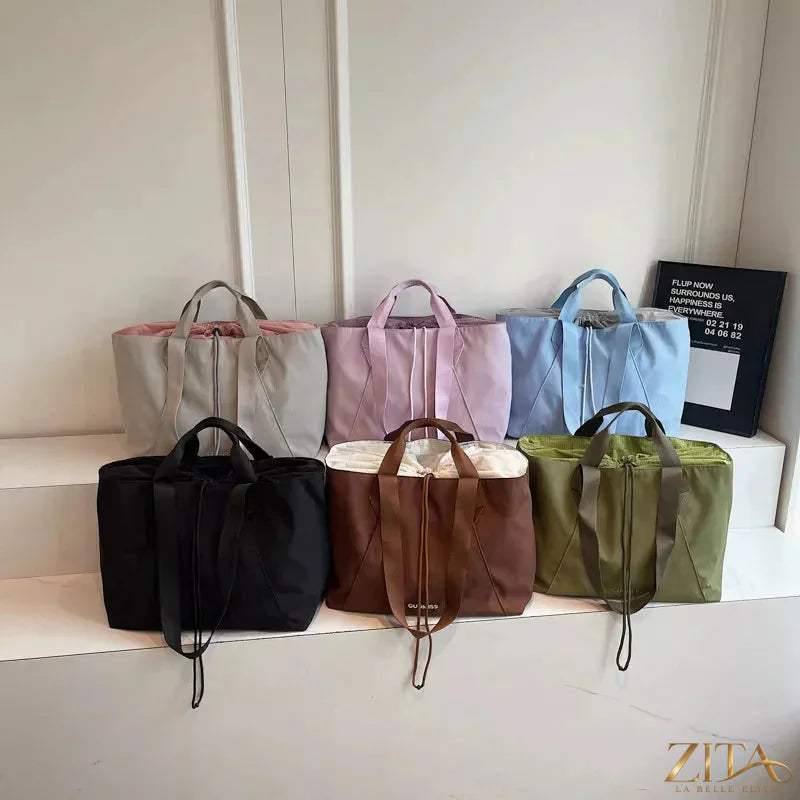 Large capacity lightweight travel tote bag by Zita La Belle Elite, showing durable fabric, spacious interior, and comfortable handles