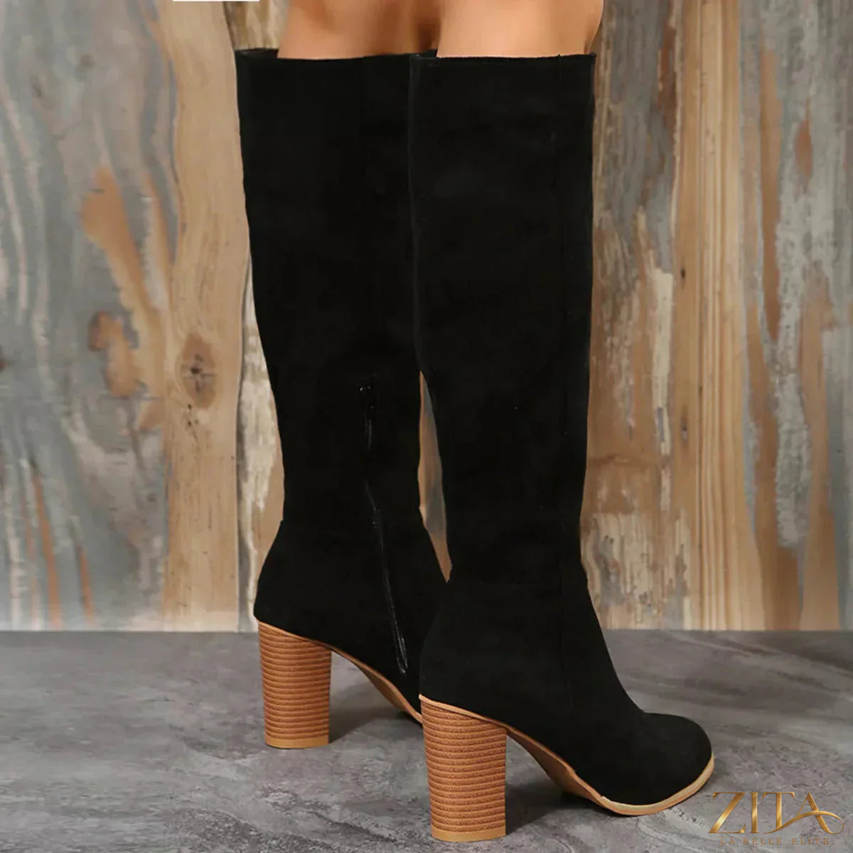 Zita La Belle Elite point toe block heel boots featuring sleek design and stylish silhouette on a white background.