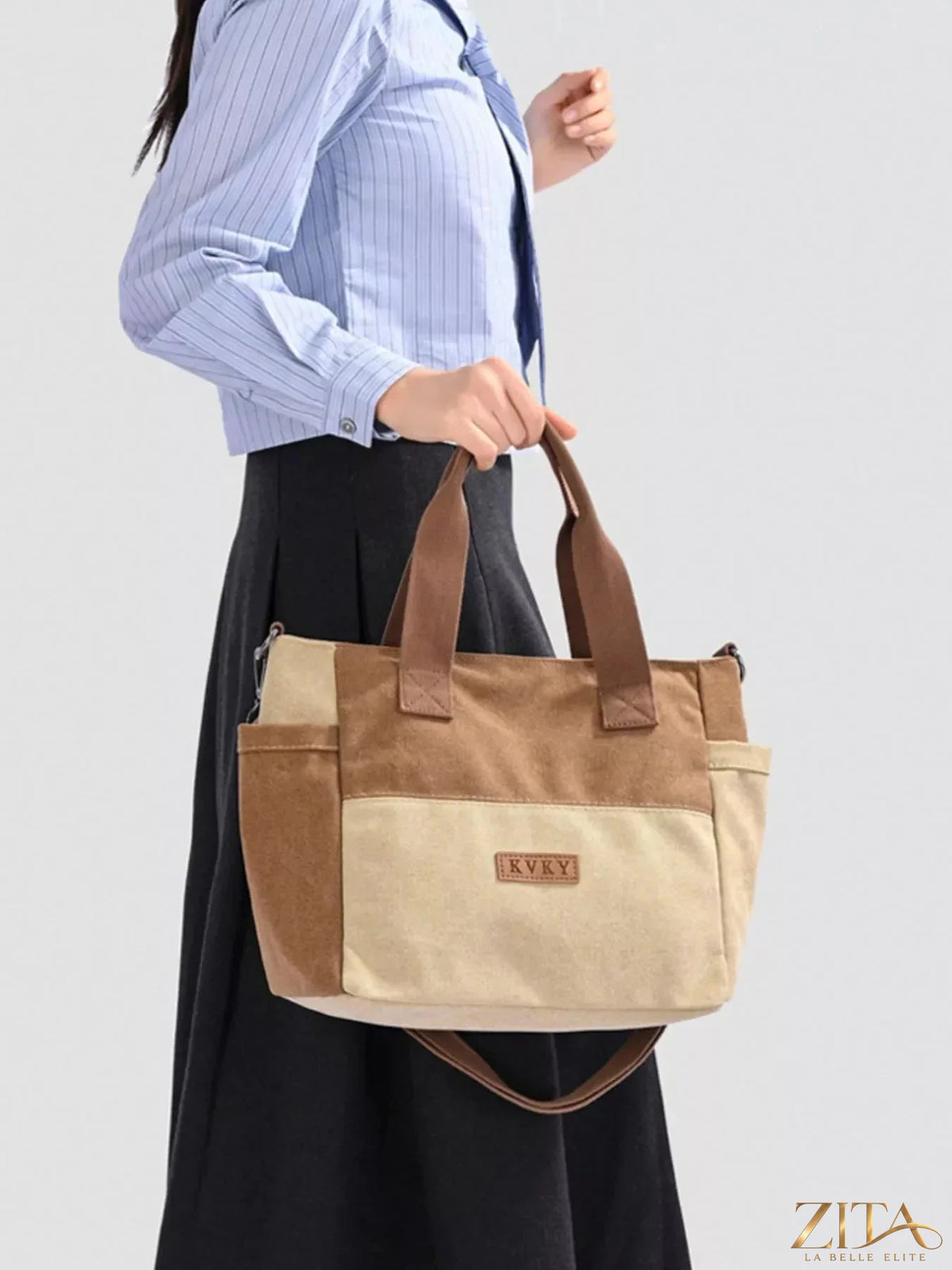 Zita La Belle Elite travel bag with multiple pockets, black nylon exterior, and sturdy handles for organized packing and travel.