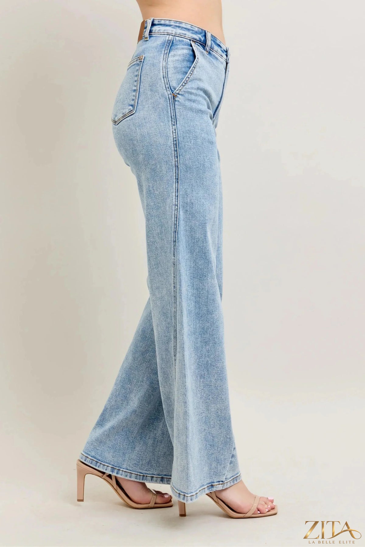 Zita La Belle Elite Judy Blue high waist wide-leg jeans with skewed inseam, denim fabric, and relaxed fit, styled on a model.