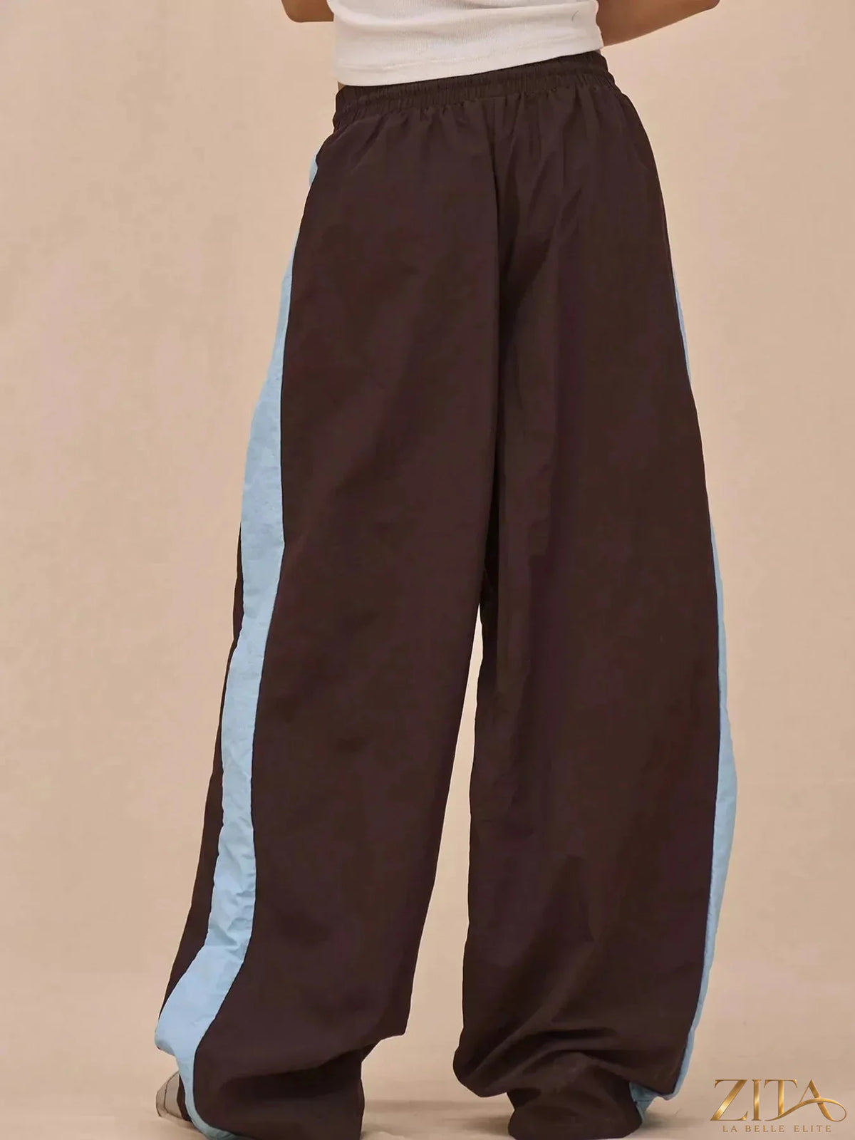 Zita La Belle Elite color-block tracksuit and wide-leg pants set with vibrant panels and comfortable fit, shown on a model.