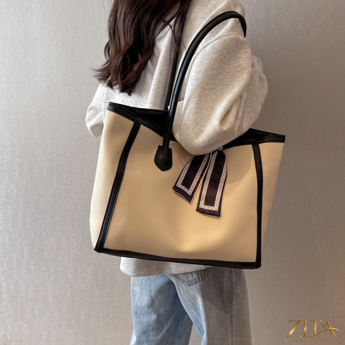Contrast tote bag by Zita La Belle Elite featuring black and white fabric with sturdy handles and spacious interior.