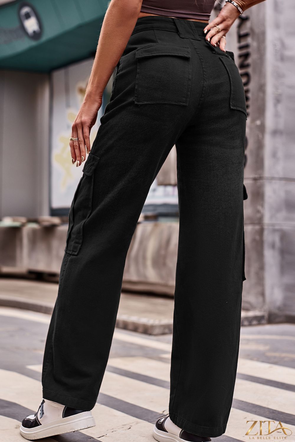 Zita La Belle Elite buttoned high waist loose fit jeans with front pockets and relaxed style, shown on a model.