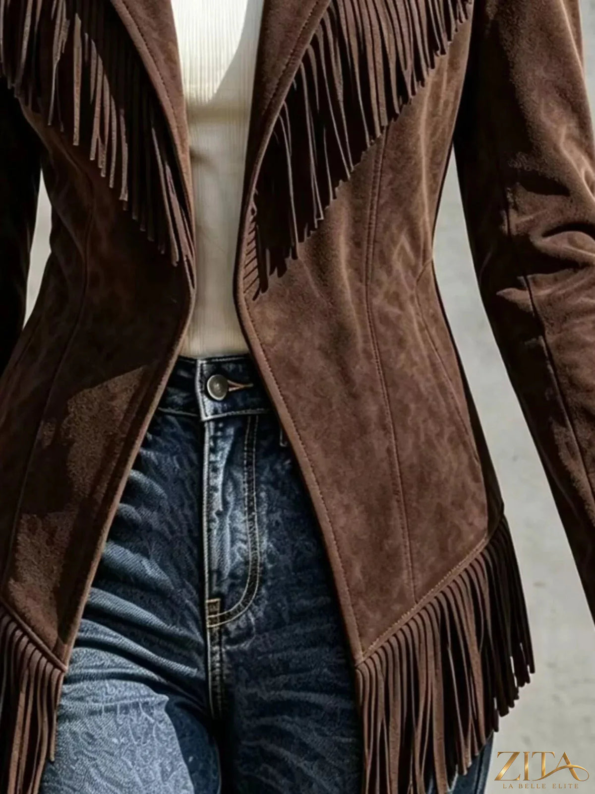 Western-inspired fringed open front jacket from Trendsi, featuring tassel details and a stylish open design.