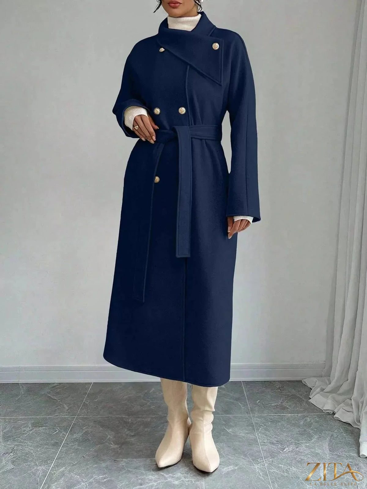 Zita La Belle Elite double-breasted longline coat in neutral fabric, stylish and warm outerwear with lapel collar and button details.