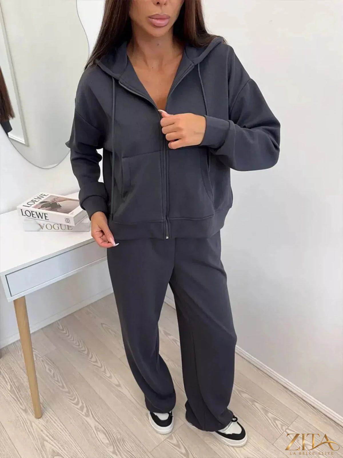 Zita La Belle Elite zip-up hoodie and wide-leg pants set, in soft fabric, shown on a model in a casual fashion pose.