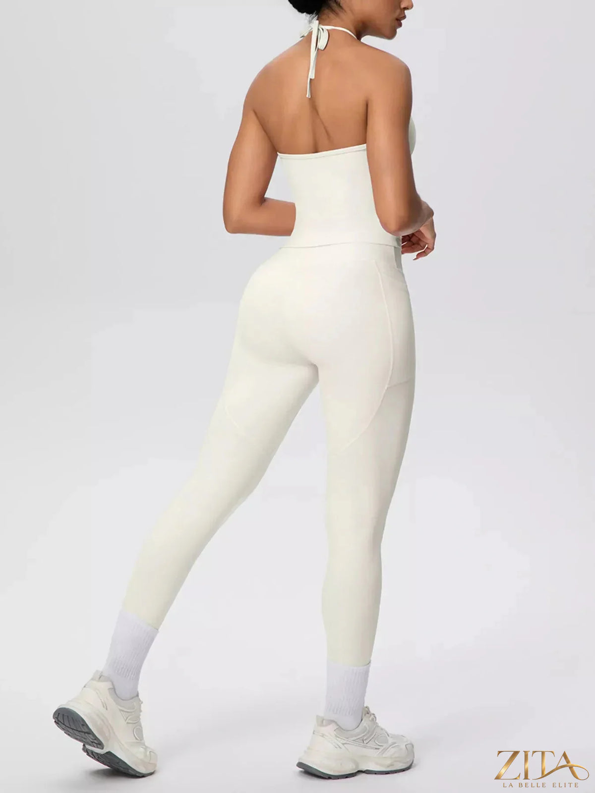 Zita La Belle Elite halter neck cami and high-waisted leggings active set, featuring a sleek black design and comfortable fit.