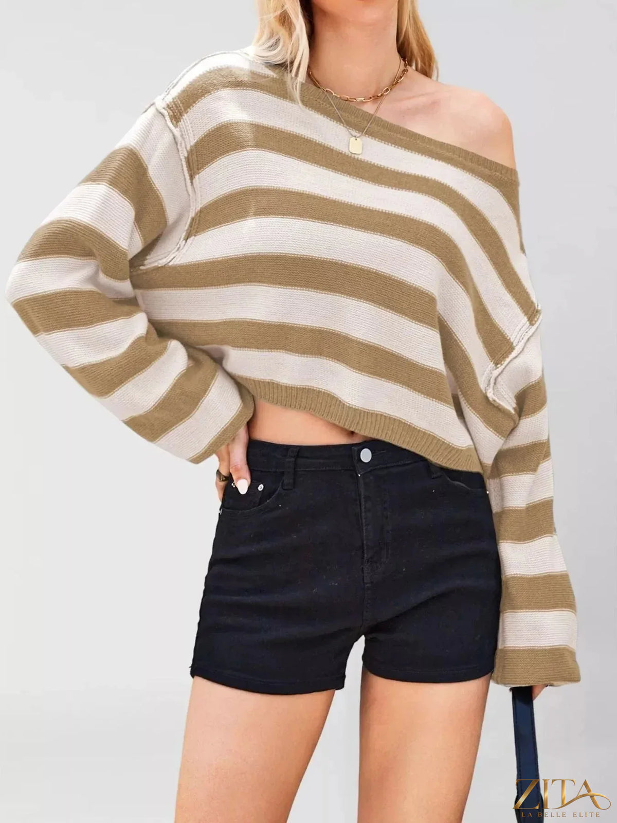 Striped boat neck sweater by Trendsi featuring horizontal multicolor stripes, soft knit fabric, and a relaxed fit.