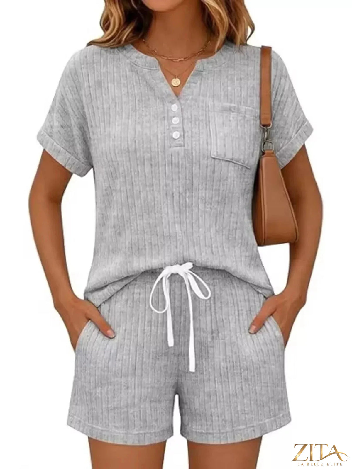 Casual ribbed knit tee and shorts set from Trendsi, featuring a comfortable, stylish matching top and bottom in neutral tones.