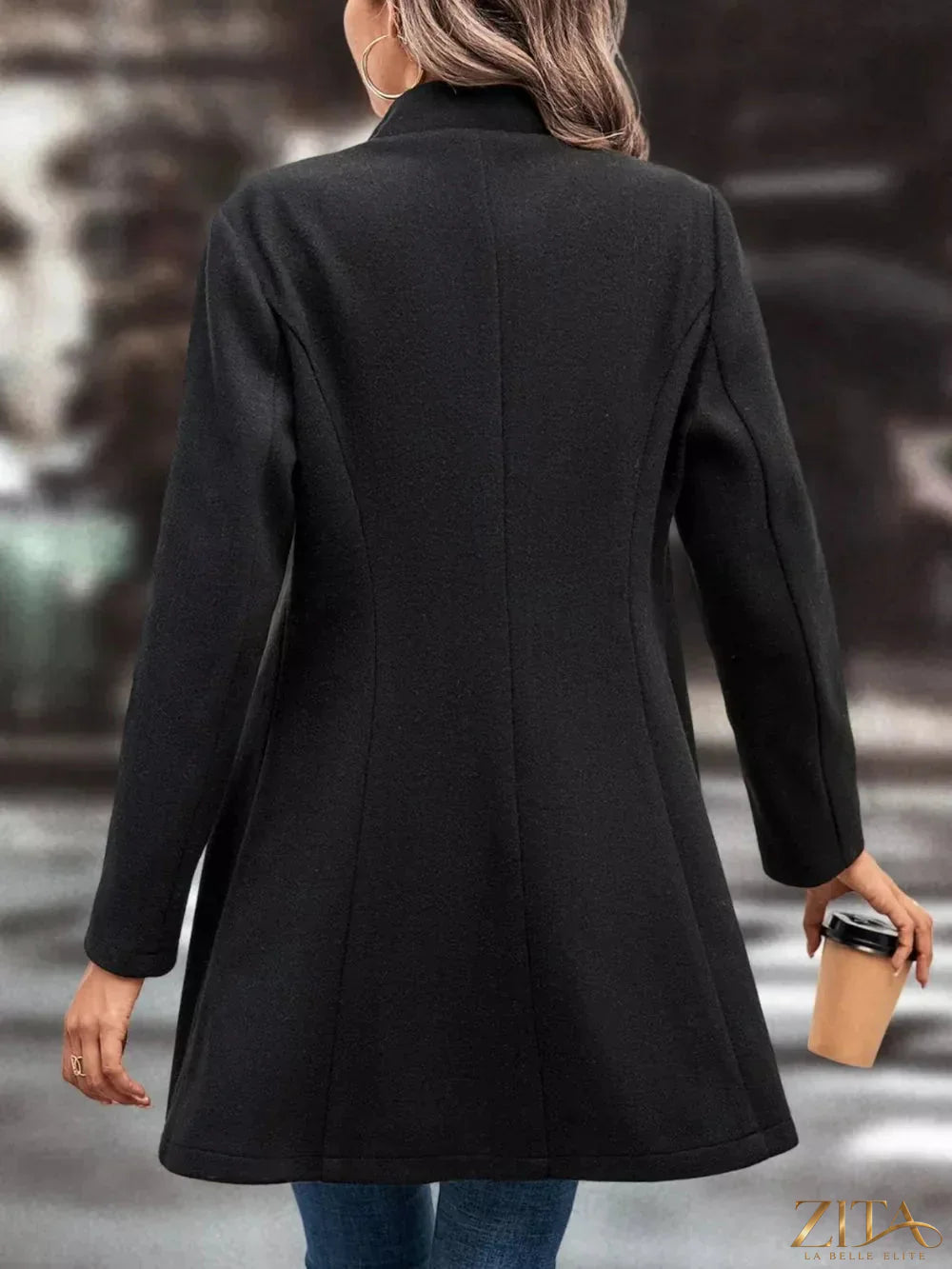 Zita La Belle Elite button-up longline coat in neutral fabric, featuring a collar and extended length for stylish warmth.