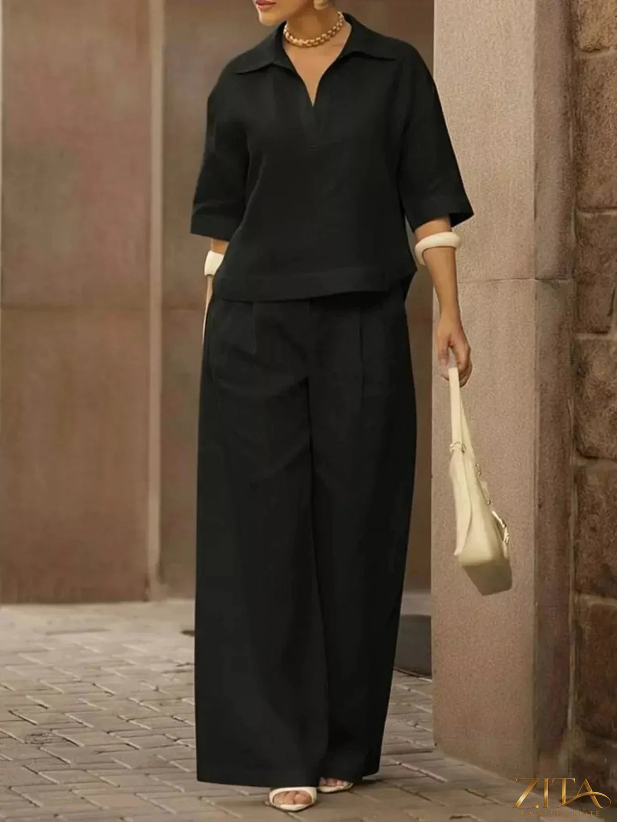 Plus size Zita La Belle Elite two-piece set with a 3/4 sleeve top and wide-leg pants, stylish and comfortable for everyday wear.
