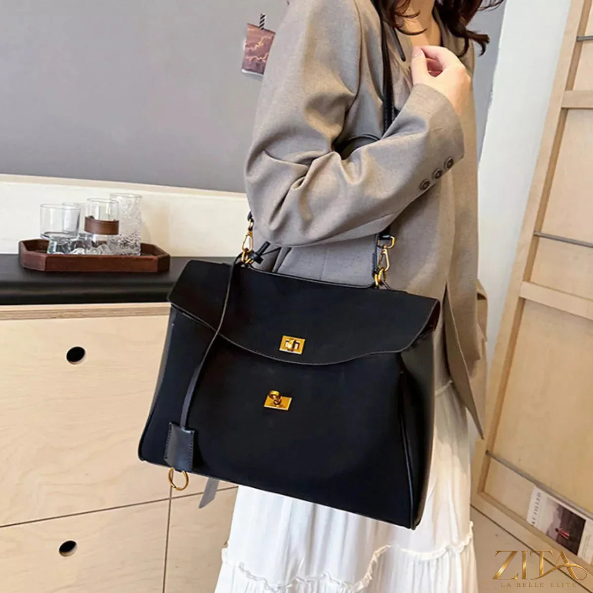 Trendsi PU leather shoulder bag with adjustable strap and top zipper closure, stylish and functional for everyday use.