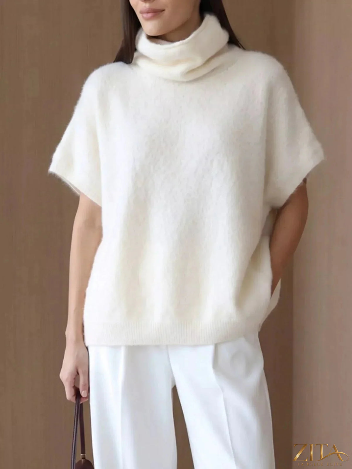 Zita La Belle Elite fuzzy short sleeve turtleneck sweater in cozy knit fabric, close-up view of the stylish design.