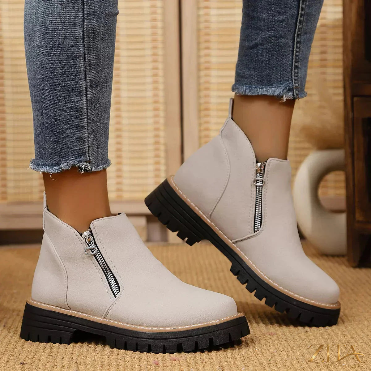 Zita La Belle Elite ankle boots with zipper accent, stylish footwear featuring a sleek design and side zipper detail.