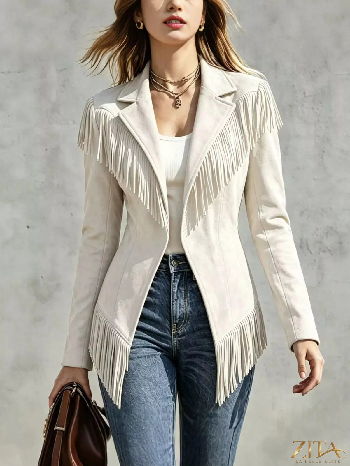 Western-inspired fringed open front jacket from Trendsi, featuring a stylish fringe design and lightweight open-front style.