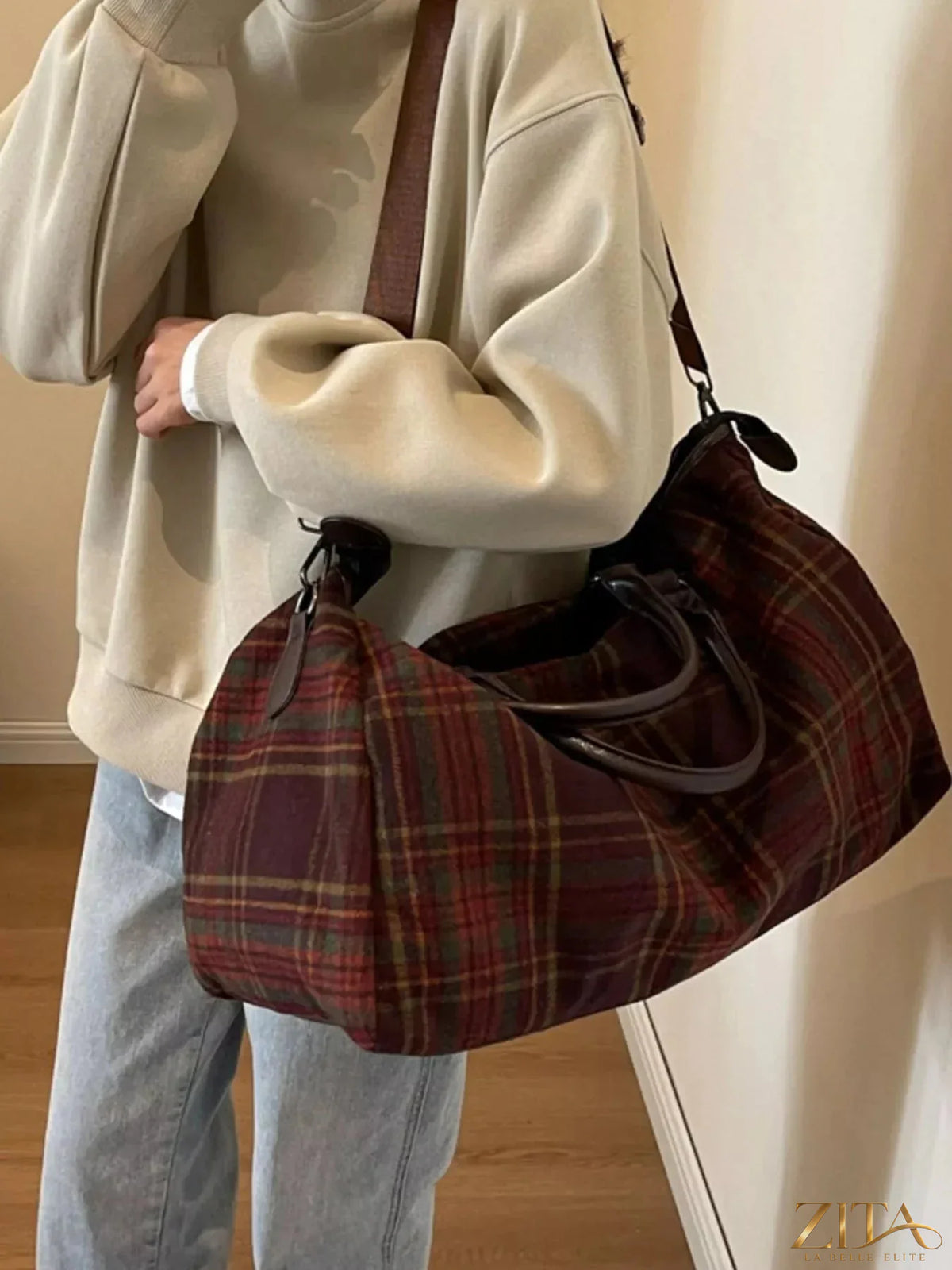 Vintage plaid pattern travel bag by Zita La Belle Elite with leather accents and sturdy handles for stylish travel use.