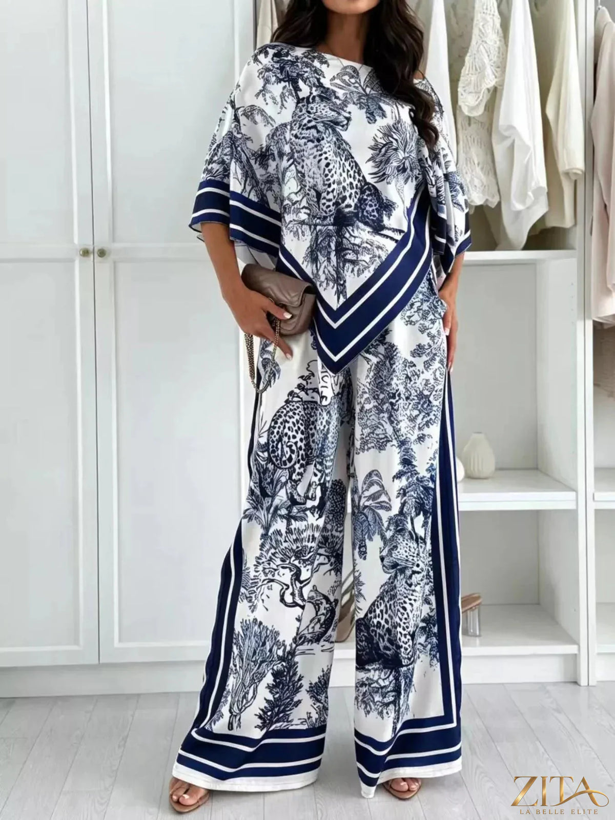Zita La Belle Elite asymmetrical printed top with wide-leg pants set, featuring bold patterns and flowing fabric.