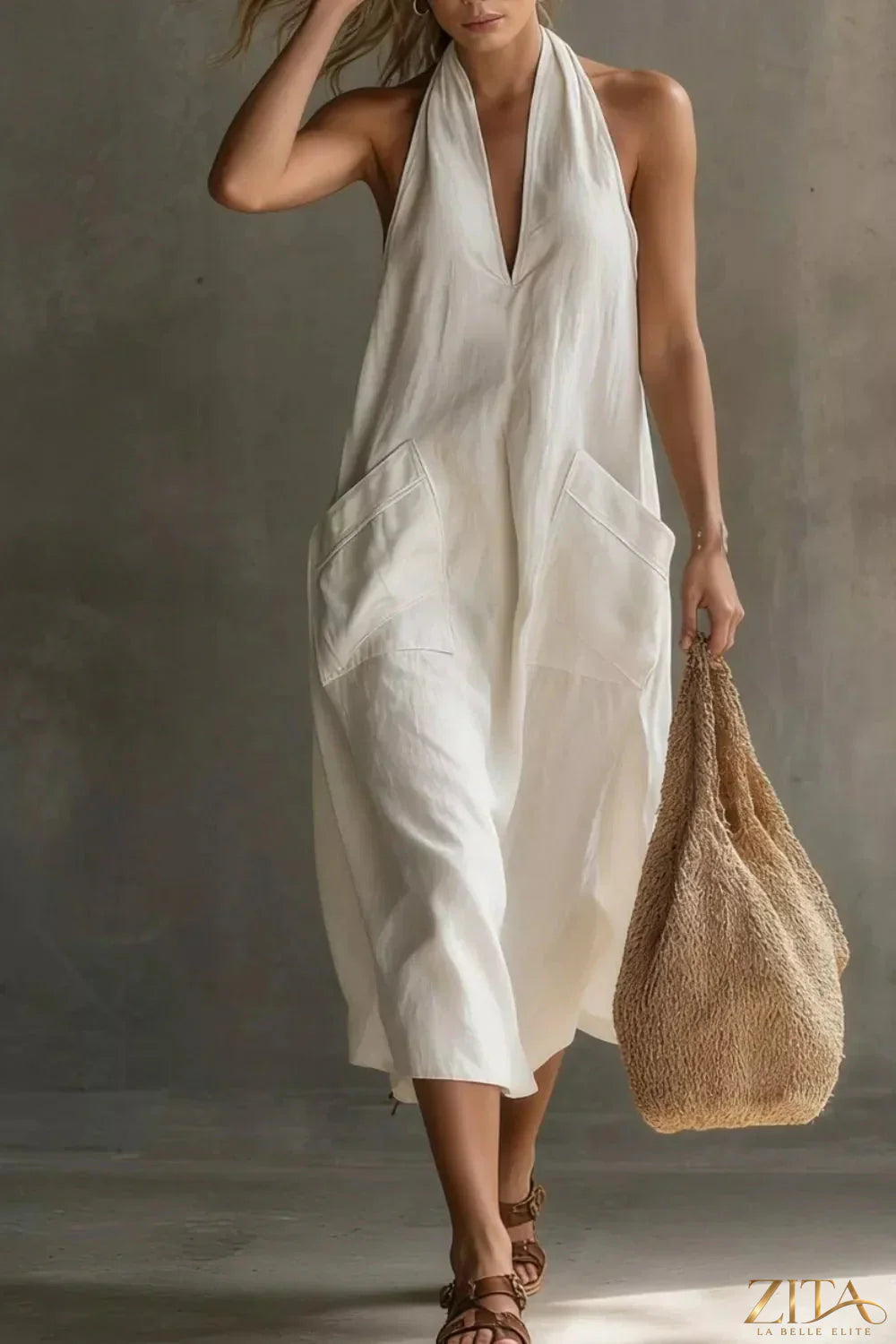 Zita La Belle Elite casual halter neck pocket midi dress featuring a relaxed fit and stylish design, shown in beige fabric.