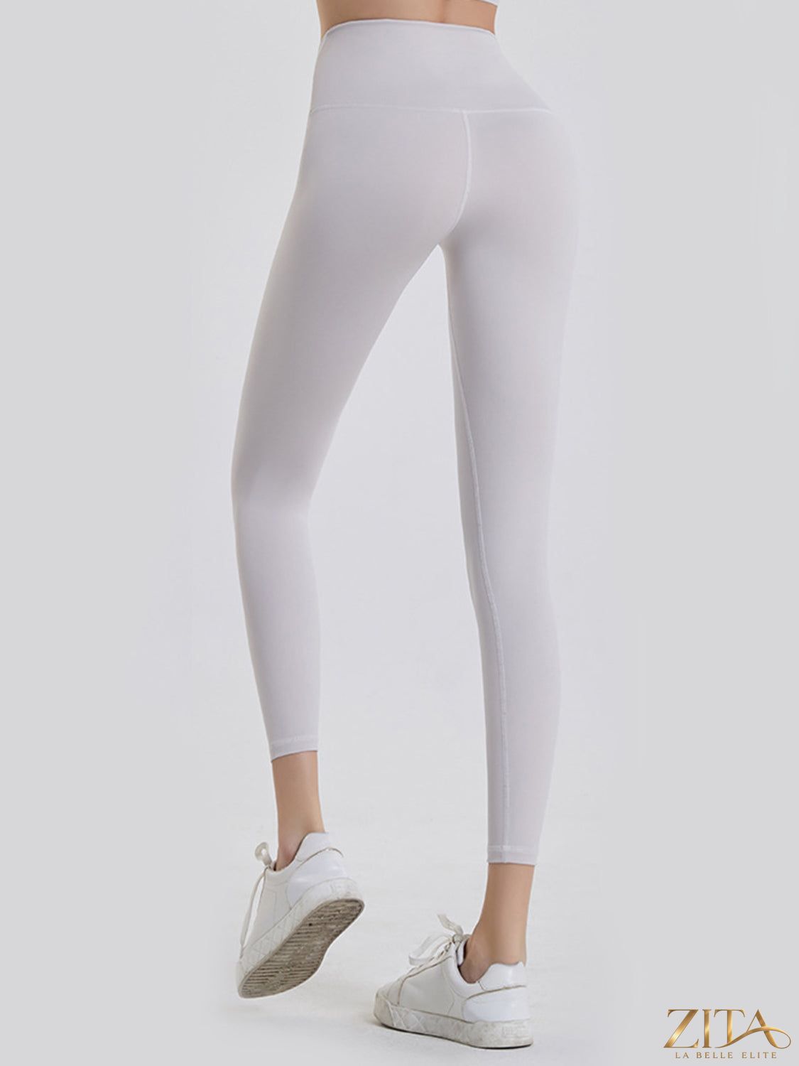 Zita La Belle Elite wide waistband sports leggings shown on a model, featuring a comfortable fit and stretchy fabric for active wear.